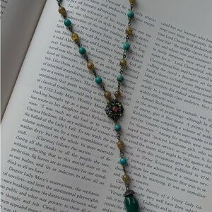 Elegant Beaded Necklace with Green and Mustard Accents